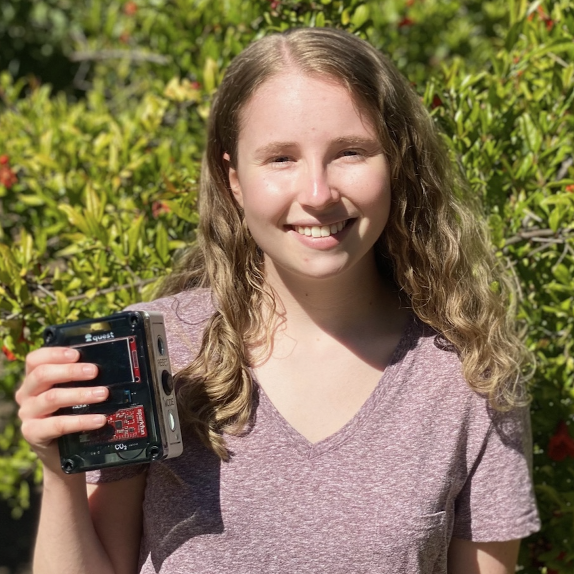 Erica holding the Quest CO2 sensor module